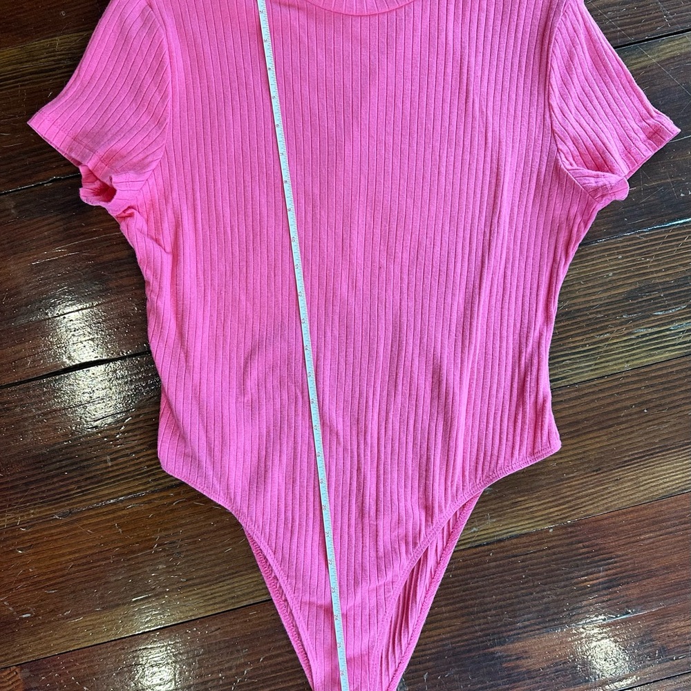 Vibrant Pink Bodysuit with High-Cut Design